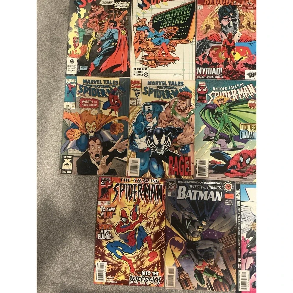Vintage 15 lot of superhero comic books from both DC and Marvel publishers.